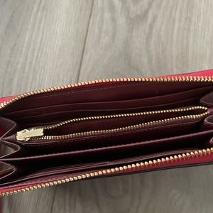 Coach wallet. Beautiful bright red! Used for 3 weeks.